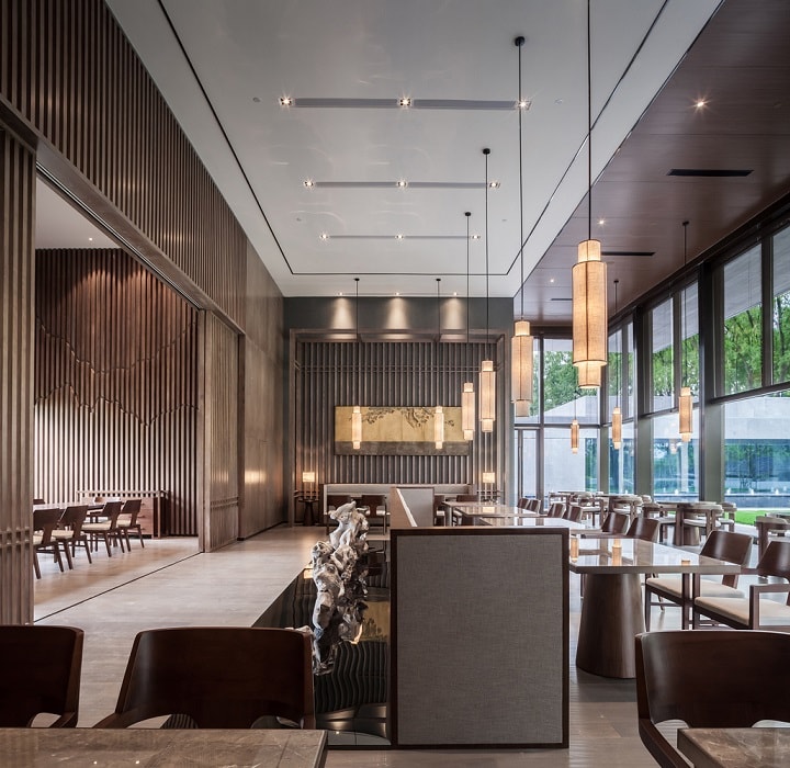 休閑茶樓裝修效果圖—現代門(mén)樓，曲折圓潤的中式藝術(shù)裝置